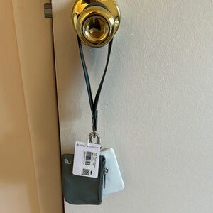 Lululemon dual wrist pouch wristlet color green/bone